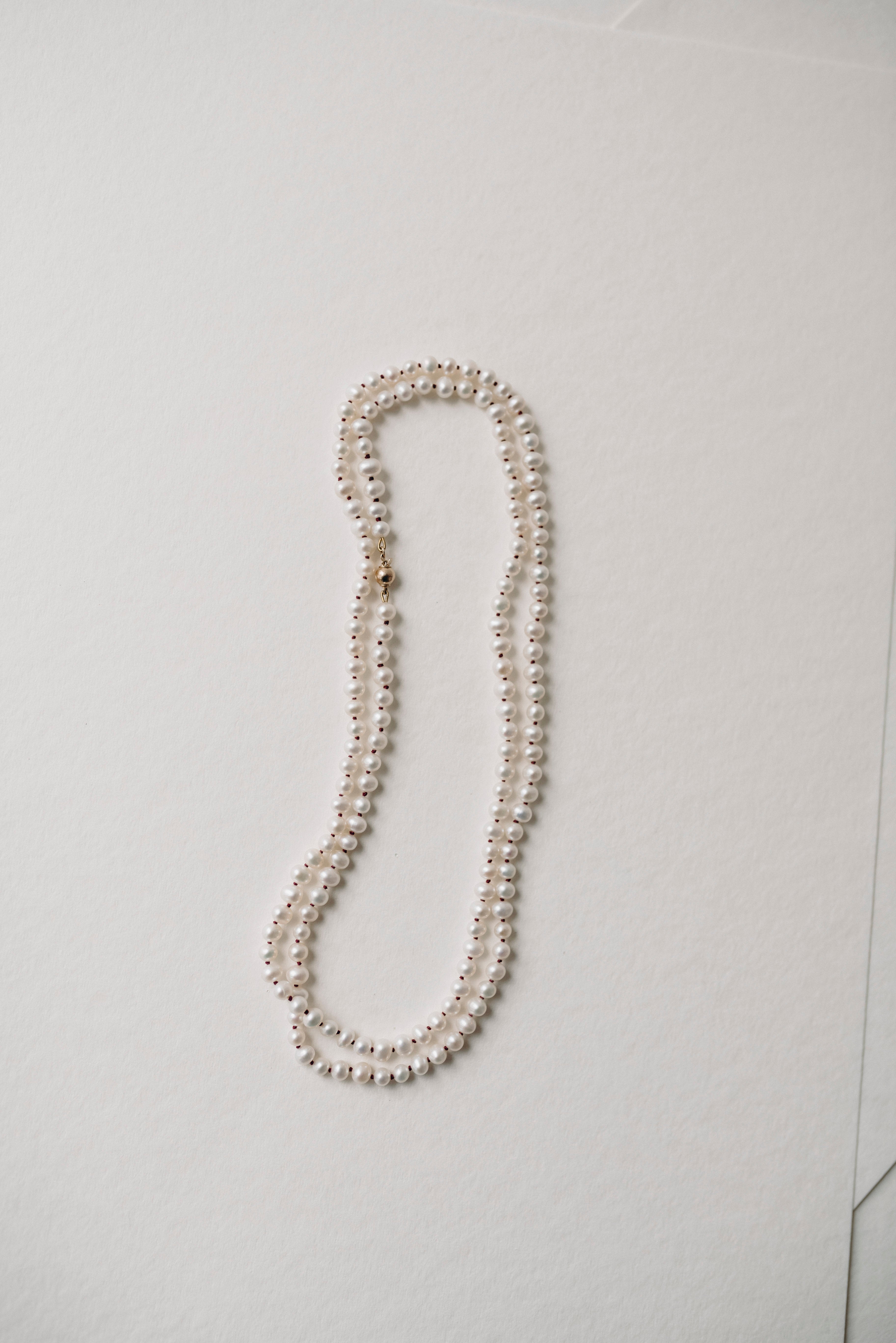 KNOTTED PEARL NECKLACE